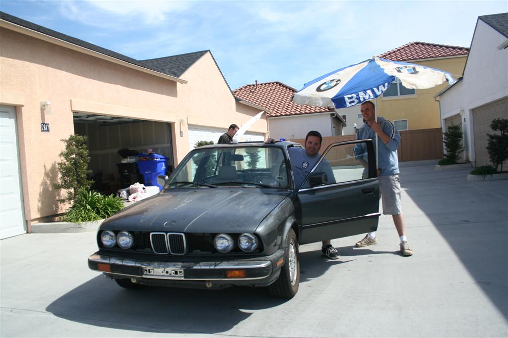 swap meet find a ratty old BMW umbrella perfect for a ratty old BMW